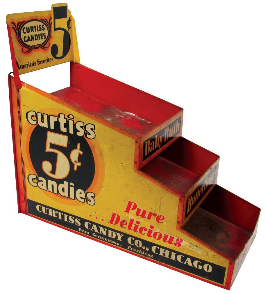 Country store display, Curtiss Candies 5 Cent Candy: Country store display, Curtiss Candies 5 Cent Candy Bars, litho on metal multi-shelf w/great graphics, mfgd by Advertising Metal Display Co.-NY & Chicago, some paint loss & wear, o/wise VG+ cond, 20"H