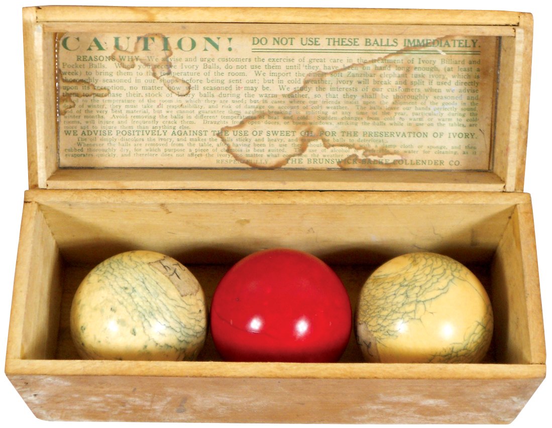 Billiard balls & box, 3 ivory 2.25" balls in: Billiard balls & box, 3 ivory 2.25" balls in Brunswick-Balke-Collender dovetailed wood box w/stenciled "Caution" warning, c.1900, Exc cond w/minor box wear & sm area of wear on 1 white ball, 3.5"H x 8