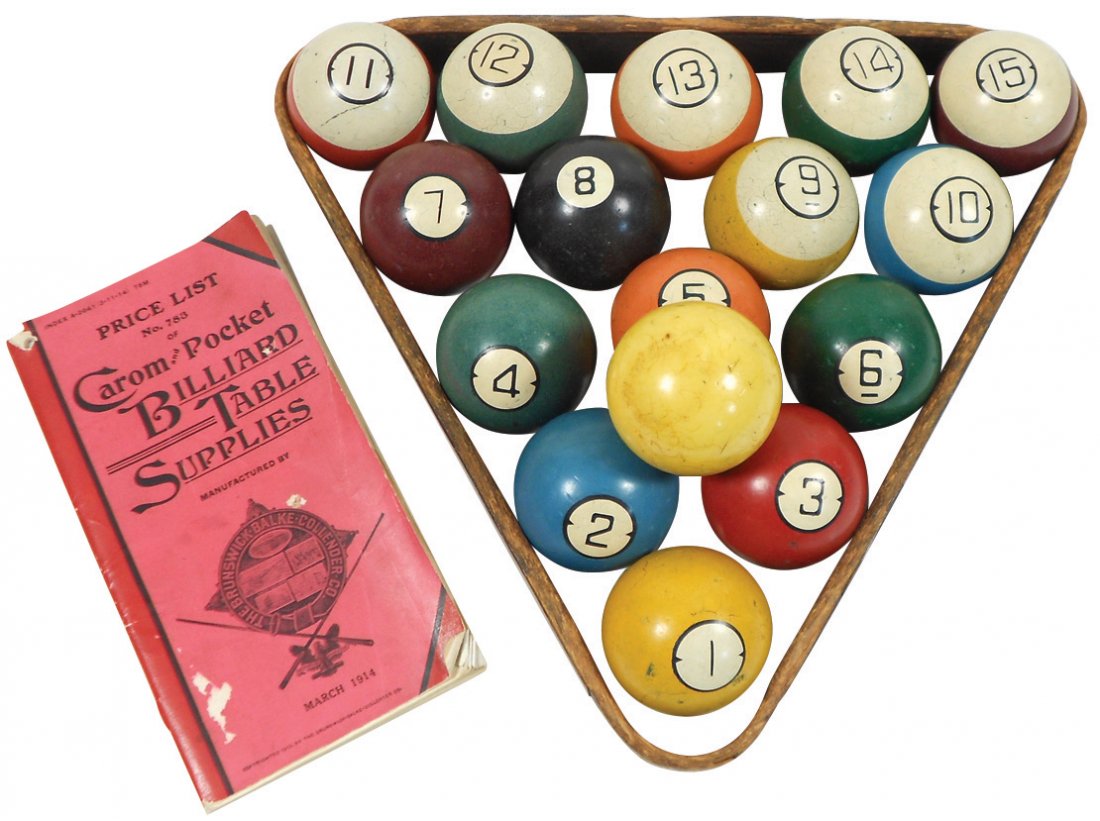 Billiard balls, triangle & sales supply booklet (18),: Billiard balls, triangle & sales supply booklet (18), set of 16 dart-style composite balls in wood triangle & 1914 Brunswick-Balke-Collender supply book, balls in Good cond w/some cracks, price book w