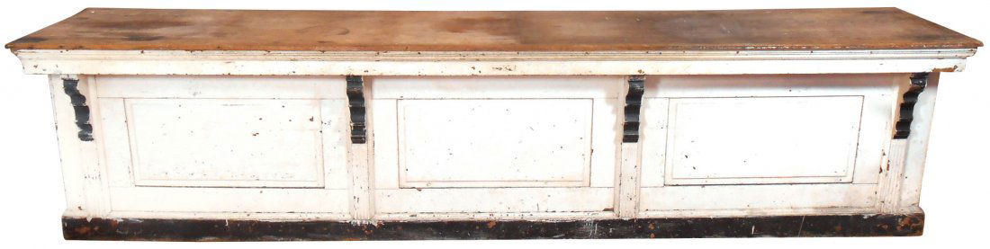 Country store counter, oak w/old black & white paint,: Country store counter, oak w/old black & white paint, paneled front & sides, open back w/shelf, egg & dart molding, maker's tag reads "Northwest Arkansas Lumber Co.-Fayetteville, Ark.", a great late 1