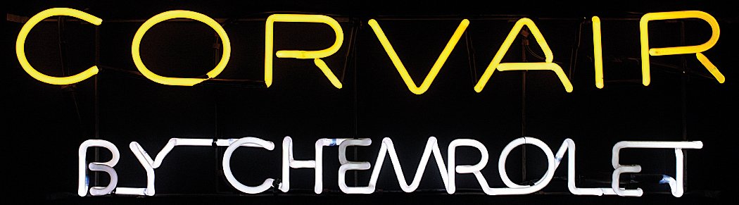 Petroliana neon sign, Corvair by Chevrolet,: Petroliana neon sign, Corvair by Chevrolet, yellow/white neon, came from the showroom of Avon Illinois Motors when it closed in the 1980's, Exc wkg cond, 10.5"H x 40"W.