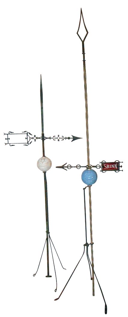 Lightning rod balls w/rods & directional arrows (2),: Lightning rod balls w/rods & directional arrows (2), blue & white Moon & Star balls, one w/Shinn ruby arrow, both VG cond, up to 72"H.
