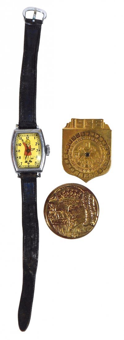 Little Orphan Annie items (3), New Haven rectangular: Little Orphan Annie items (3), New Haven rectangular wrist watch w/orig leather band, c.1935, VG cond but does not keep good time, Secret Compartment Brass Decoder, c.1936 & Speed-O-Matic Brass Decode