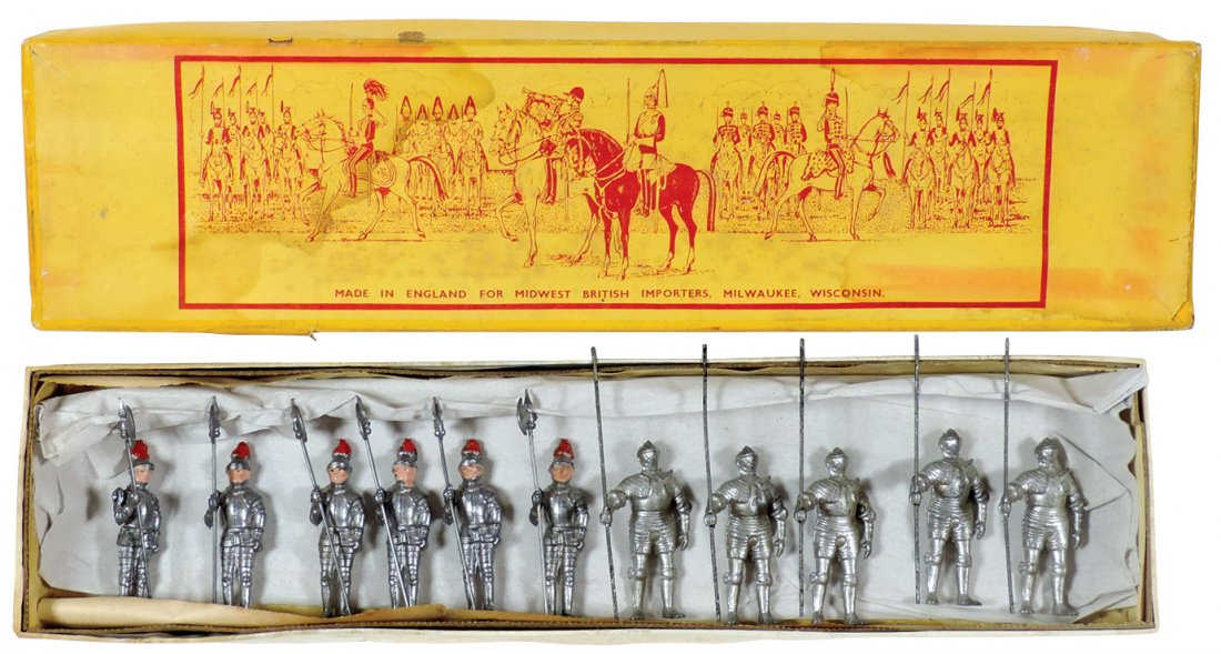 Toy lead figures, set of 11 knights in orig box, by: Toy lead figures, set of 11 knights in orig box, by Midwest British Importers-England, 6 knights have movable right arms, all have weapons, VG cond w/Poor box, box 1.5"H x 14.25"W x 3.75"L.