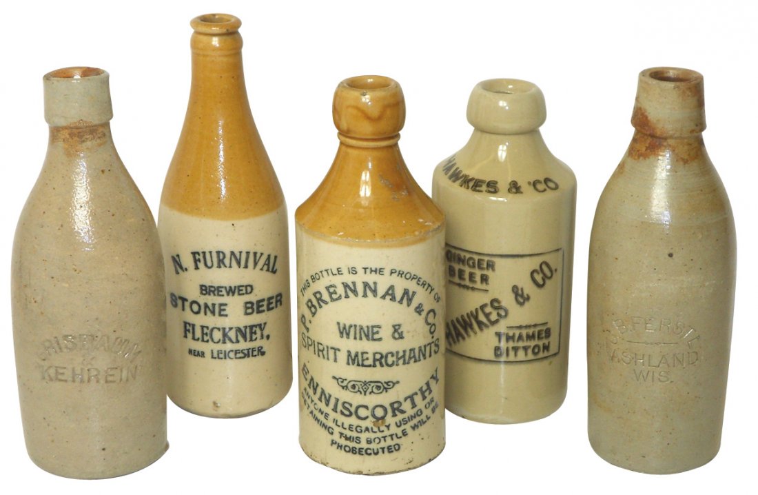 Stoneware advertising bottles (5), J.B. Ferstl-Ashland,: Stoneware advertising bottles (5), J.B. Ferstl-Ashland, WI, Grisbaum & Kehrein, N. Furnival Stone Beer-Fleckney, Hawkes & Co. Ginger Beer-Thames Ditton & P. Brennan & Co., all VG & Exc cond, 6.5" to 8