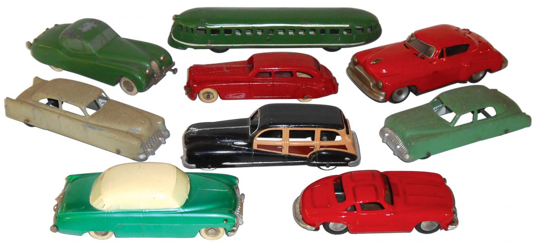 Toy cars & bus (9); Jaguar XK120, Mercedes SL Gullwing,: Toy cars & bus (9); Jaguar XK120, Mercedes SL Gullwing, Woody Cadillac, Tootsie, Prameta, Japan, etc., tin windups, friction, etc, Good/VG cond, up to 9"L.