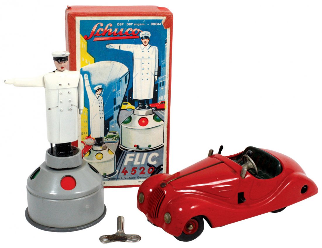 Toys (2), Schuco Examico 4001 (missing key &: Toys (2), Schuco Examico 4001 (missing key & windshield) & Flic 4520 Stop & Go Traffic Officer in Near-Mint cond w/orig box, car VG cond w/minor paint wear, up to 5.5"H.