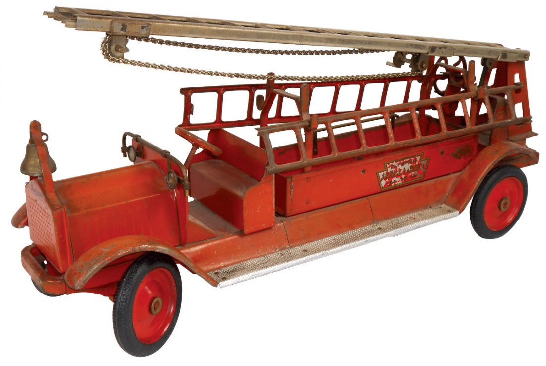Toy fire truck, Keystone-Packard Aerial Ladder 79,: Toy fire truck, Keystone-Packard Aerial Ladder 79, pressed steel, VG cond w/some paint wear, 30.5"L.
