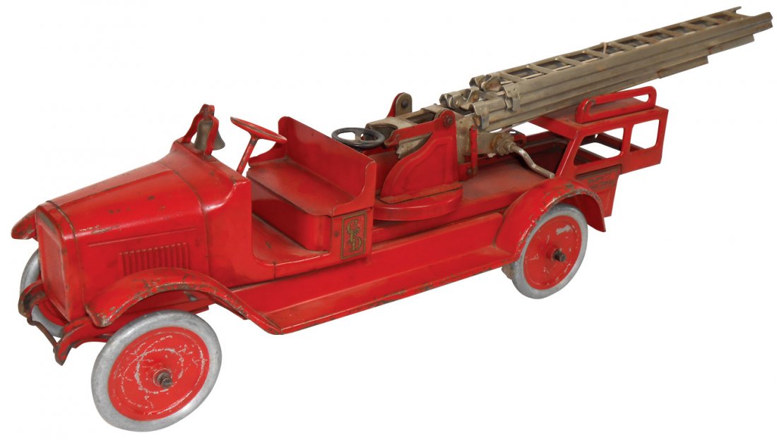 Toy fire truck, Buddy L Aerial Ladder, pressed steel,: Toy fire truck, Buddy L Aerial Ladder, pressed steel, VG/Exc cond w/some paint wear, 38.5"L w/ladders down.