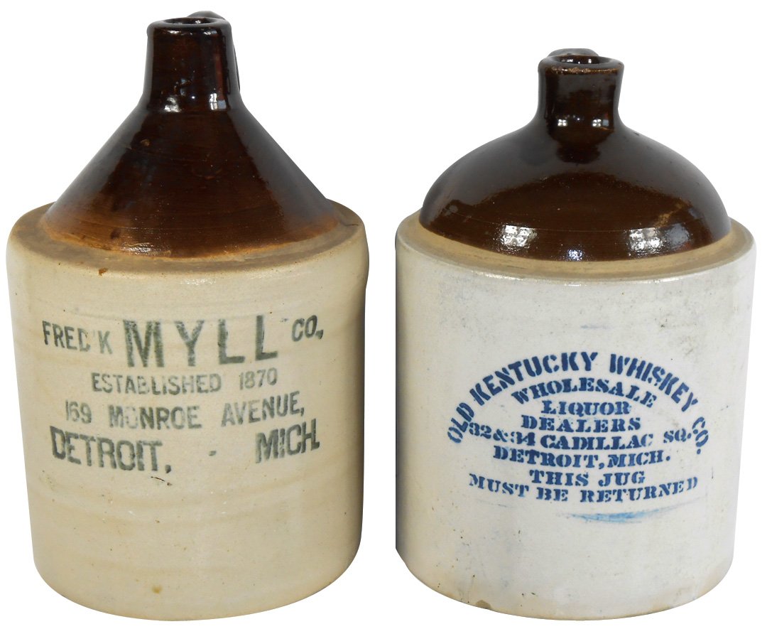 Stoneware advertising jugs (2), Old Kentucky Whiskey &: Stoneware advertising jugs (2), Old Kentucky Whiskey & Wholesale Liquor Dealers-Detroit, Mich., minor base chips & Fred'k Myll Co.-Ext. 1870, Detroit, Mich., Exc cond, 11" & 12"H.