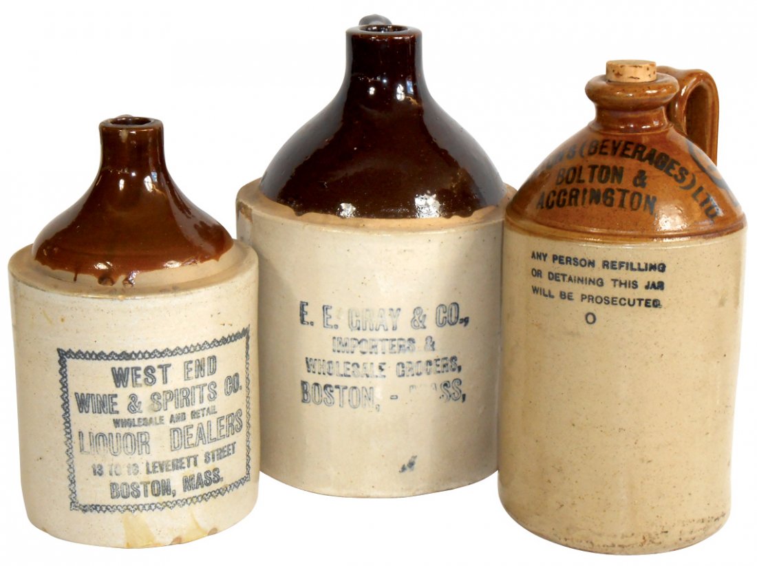Stoneware advertising jugs (3), E. E. Gray & Co.: Stoneware advertising jugs (3), E. E. Gray & Co. Importers & Wholesale Groceries-Boston, Mass., 1.25" shoulder chip, Stanton's Beverages-Boston & Accrington, Exc cond & West End Wine & Spirits Co. Liq