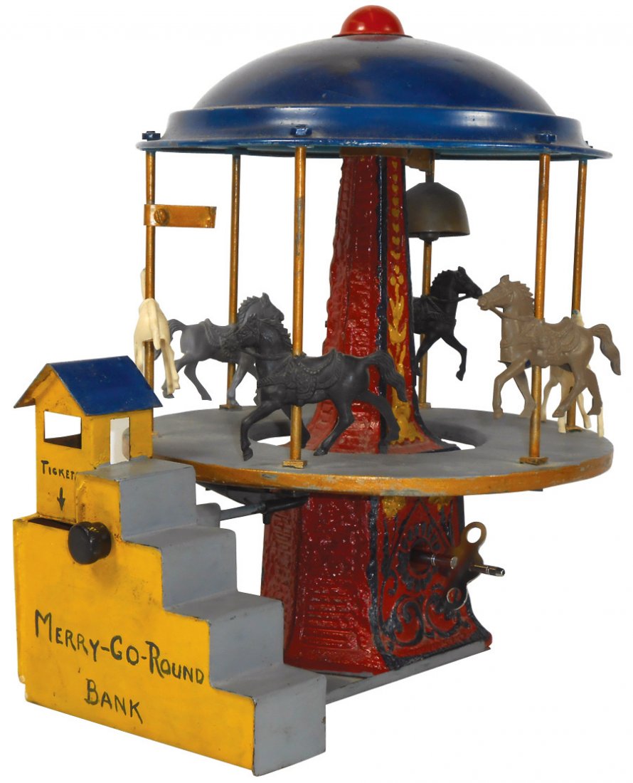 Toy merry-go-round bank, made from an 1800's fly fan: Toy merry-go-round bank, made from an 1800's fly fan fancy cast iron base that has a windup clockwork mech, ticket booth w/slot for money on side, very unusual & whimsical, VG working cond, 13.5"H x 1