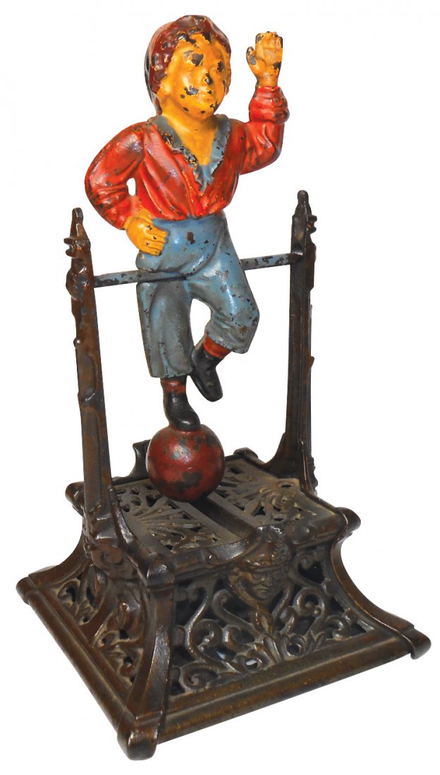 Bank, mechanical, Boy on Trapeze, mfgd by J. Barton: Bank, mechanical, Boy on Trapeze, mfgd by J. Barton Smith Co., patd 1888, cast iron w/orig paint, VG/Exc cond, 9"H.