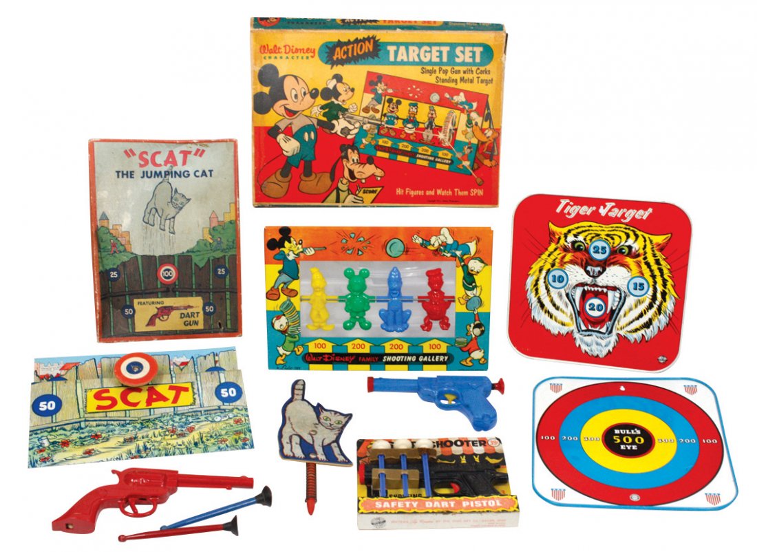 Toys & games (5), Walt Disney Action Target set in orig: Toys & games (5), Walt Disney Action Target set in orig box, tin; Scat the Jumping Cat game, complete in orig box, tin & wood w/plastic gun; Sharpshooter Safety Path Pistol in orig pkg & 2 Ohio Art ti