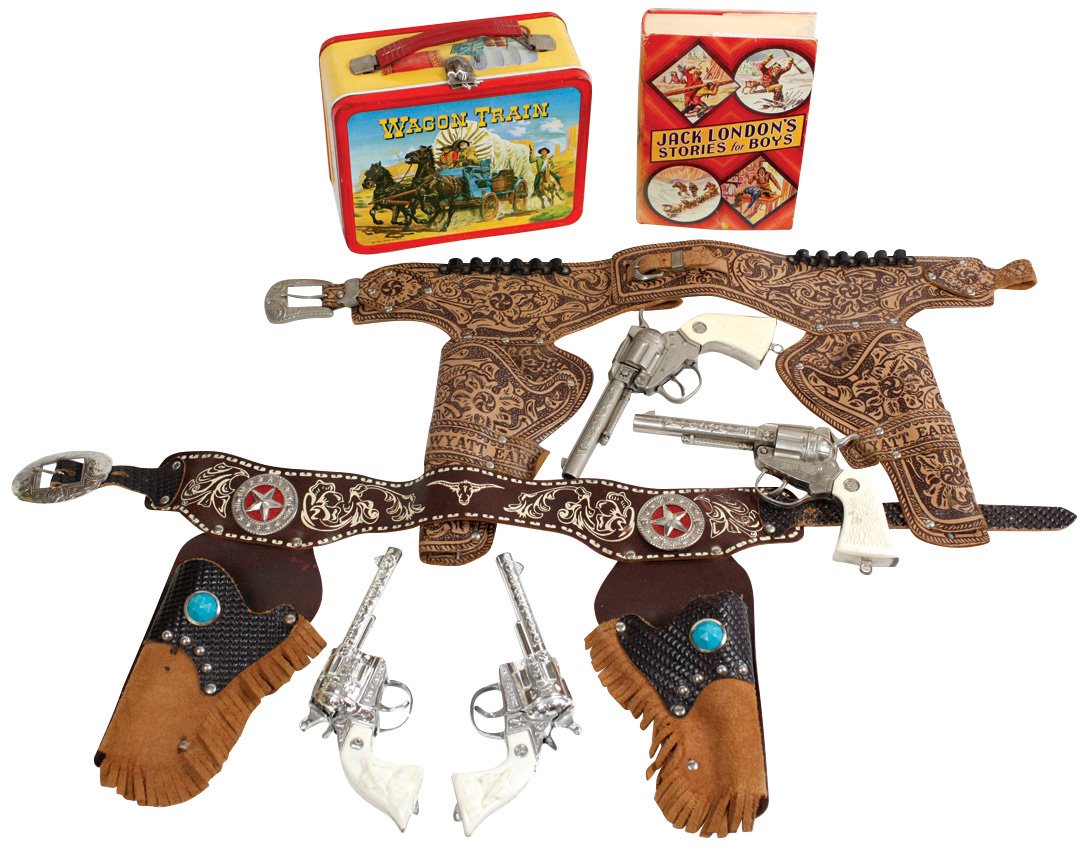 Western toys, lunch box & book (4), Wagon train lunch: Western toys, lunch box & book (4), Wagon train lunch box & thermos, "Jack London's Stories for Boys" book, 2 leather double holster sets (1 w/Kilgore Kit Carson pistols, other marked Wyatt Earp), VG/