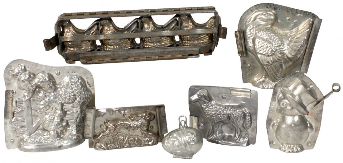 Chocolate molds (7), turkey, rabbit, lamb, chicken: Chocolate molds (7), turkey, rabbit, lamb, chicken w/top hat, 4 hens on nests, 3 children w/rabbit & egg, all 2-pc zinc molds in Exc cond, up to 6.5"H x 11"L.
