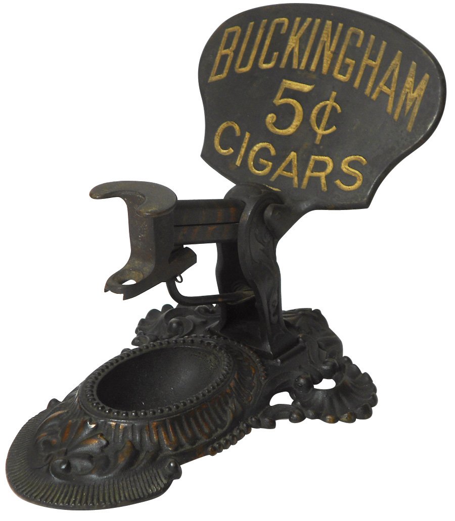 Advertising cigar cutter, Buckingham 5 Cent Cigars,: Advertising cigar cutter, Buckingham 5 Cent Cigars, cast iron w/copper wash, mfgd by Erie Specialty Co.-Erie, PA, March 1904, Exc cond, 8"H x 6.5"W.