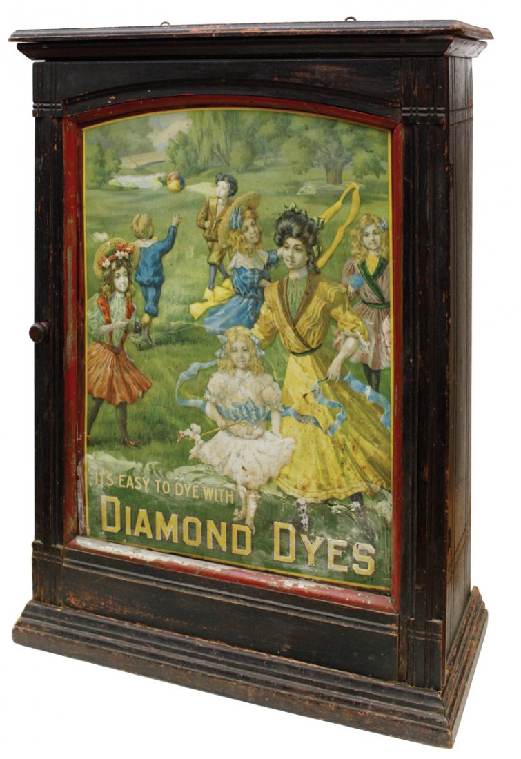 Country store Diamond Dye cabinet, "Governess" litho on: Country store Diamond Dye cabinet, "Governess" litho on embossed metal insert, wood case, c.1910, orig worn surface on wood, metal insert in Fair/Good cond, 30"H x 22.5"W.