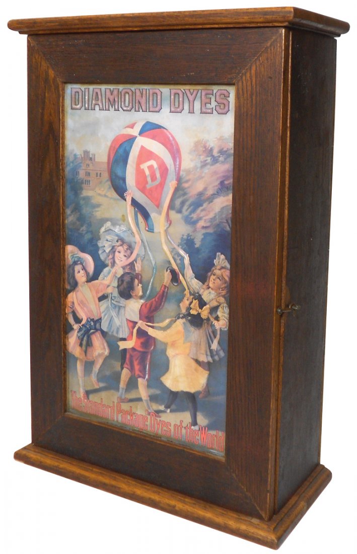 Country store Diamond Dye cabinet, newer replacement: Country store Diamond Dye cabinet, newer replacement "Children with the Balloon" embossed metal insert & replaced back, Good overall cond w/interior cubbies, 25.5"H x 17"W.