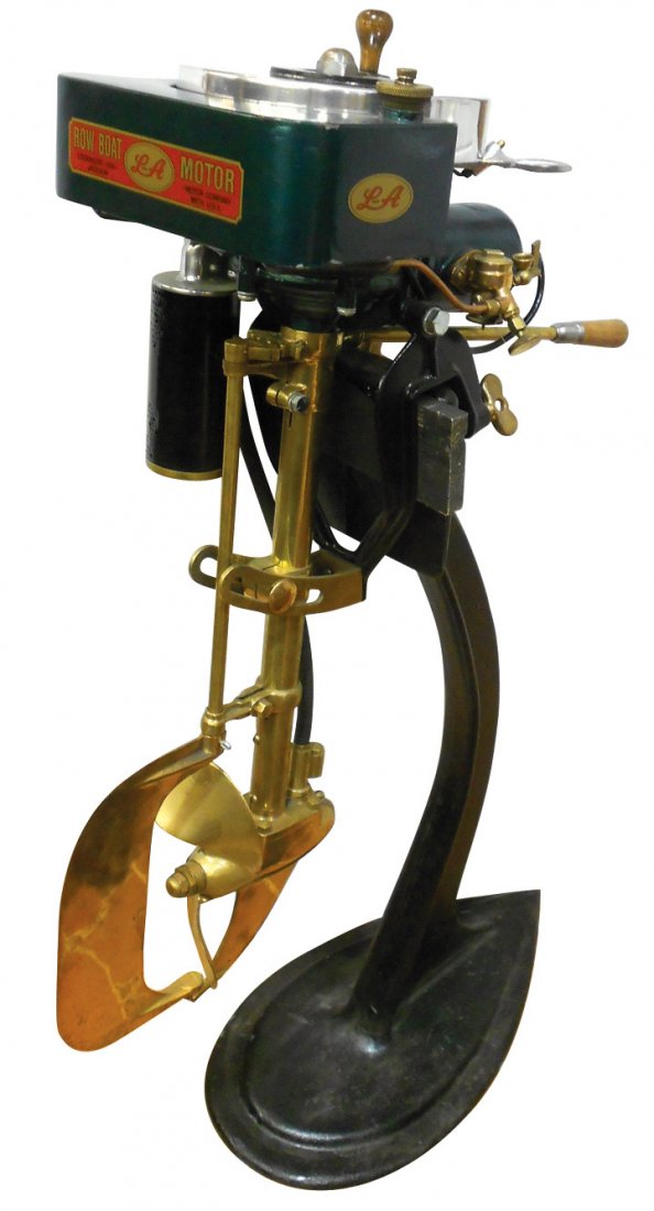 Boat motor, L-A Row Boat Motor-Lockwood Ash Motor: Boat motor, L-A Row Boat Motor-Lockwood Ash Motor Co.-Jackson, Mich., complete w/cast iron stand, an older restoration in Exc cond w/minor paint chips, 48"H.