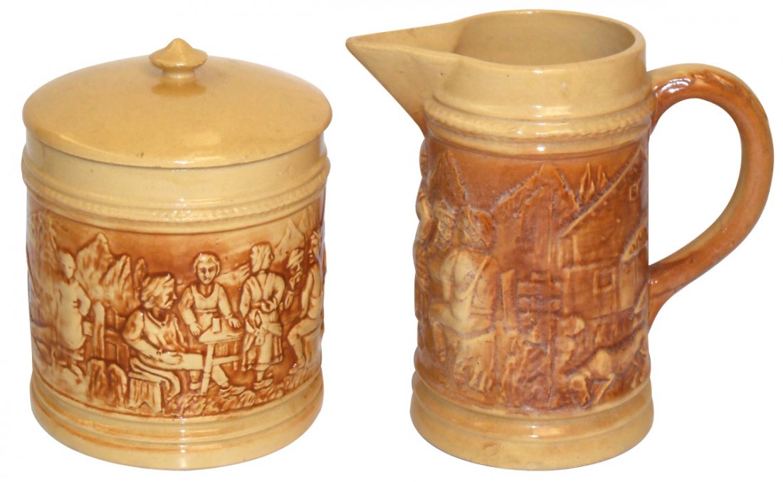 Pottery pitcher & cookie jar, McCoy, Frontier Family,: Pottery pitcher & cookie jar, McCoy, Frontier Family, pitcher has some glaze discoloring & chip on spout, cookie jar has sm hairline on top of lid & flea bite on bottom of lid, 9.5" & 10"H.