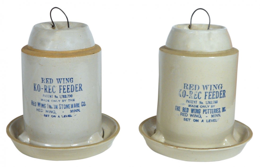 Stoneware feeders (2), Red Wing Ko-Rec Feeders, both 1: Stoneware feeders (2), Red Wing Ko-Rec Feeders, both 1 gal but different patent nos., 1 Exc cond, other has chip on foot of feeder & hairline on bottom plate, both 10.5"H x 10"Dia.