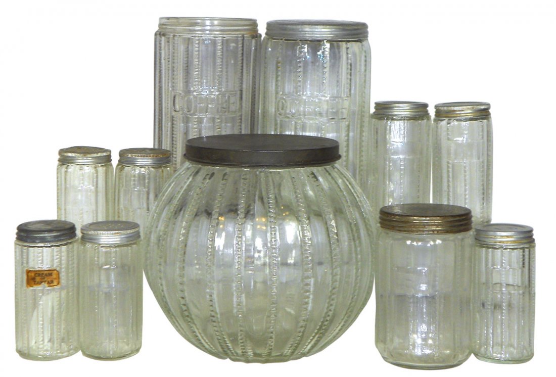 Kitchen cabinet jars (11), Zipper pattern cookie,: Kitchen cabinet jars (11), Zipper pattern cookie, coffee (1 w/missing lid) & tea jars plus 7 spice jars w/lids, Exc cond, cookie jar 7"H x 8"Dia.
