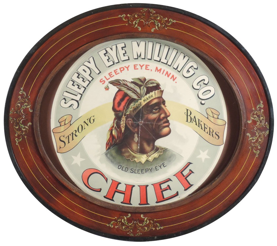 Country store barrel label, Sleepy Eye Milling Co.,: Country store barrel label, Sleepy Eye Milling Co., great Old Sleepy Eye Indian graphic, litho on paper in period oval frame, paper shows fold lines w/sm hole in center, VG cond & displays well, 21.25