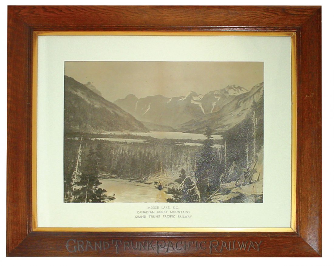 Railroad, print, Grand Trunk Pacific Railway litho on: Railroad, print, Grand Trunk Pacific Railway litho on paper, Moose Lake, B.C., Canadian Rocky Mountains, c.1900, orig thick oak adv frame w/Grand Trunk Pacific Railway carving, litho has a few small s