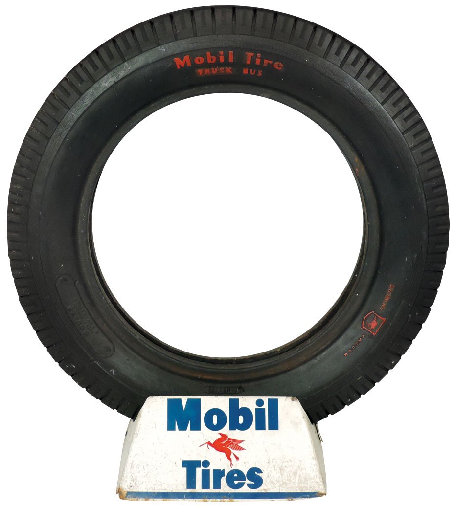 Automobilia, display rack, Mobil Tires w/Pegasus, early: Automobilia, display rack, Mobil Tires w/Pegasus, early truck or bus tire, rack in Good cond, tire is new-old-stock, 35"H x 32"W.