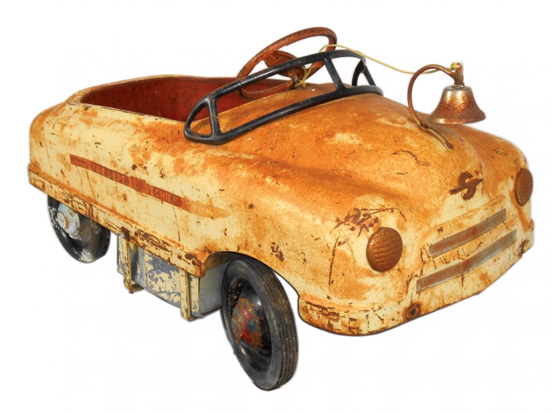 Carnival kiddie ride car, pressed steel, "Weldon Fire: Carnival kiddie ride car, pressed steel, "Weldon Fire Dept." stenciled on side, Sherwood-Walden-NY, c.1940's-1950's, has windshield & bell, Good cond w/old yellow orange paint, 22"H x 38"L.