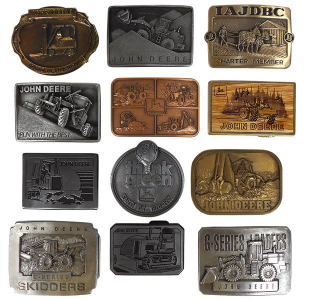 John Deere belt buckles (12), Power in Trucking-No. 86: John Deere belt buckles (12), Power in Trucking-No. 86 in 100, 1983 Utility Crawler, 1983 New Era, Dubuque Industrial w/hinged belt loop, 1988 Endloader, 1988 Bulldozer w/blade, 1994 G-Series Loaders,