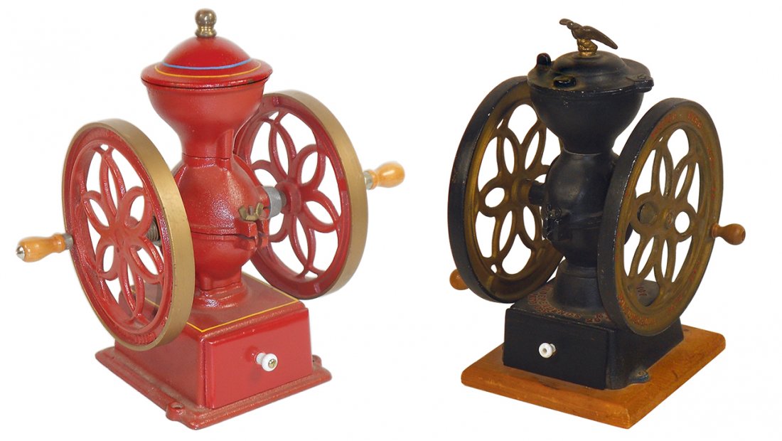 Country store coffee mills (2), both lap top, John: Country store coffee mills (2), both lap top, John Wright Inc.-Wrightsville, PA, cast iron w/wood receiver, 11.5"H w/6.5"Dia wheels & Independence Mfg. Co.-Boston, cast alum w/wood receiver & eagle fi