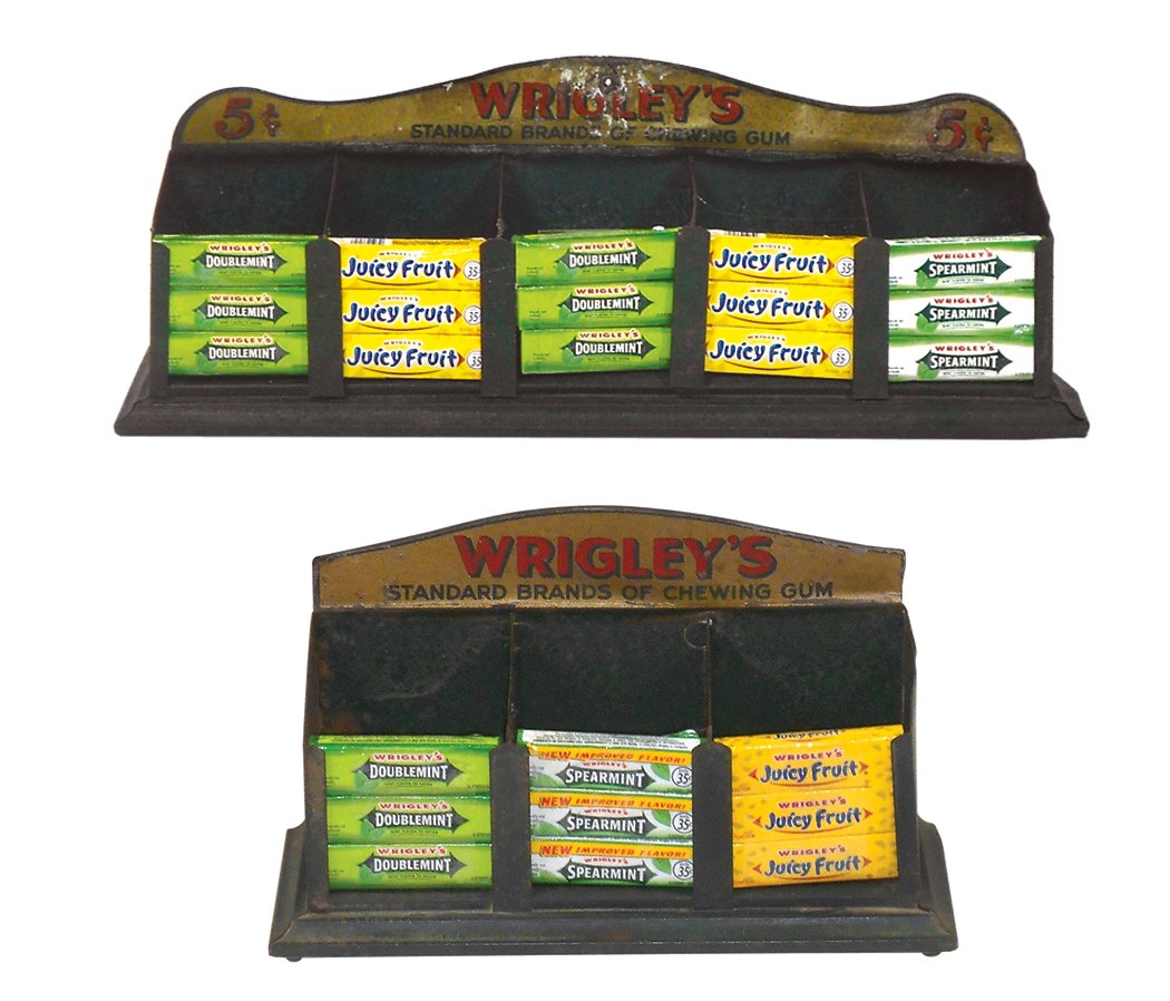 Country store display racks (2), Wrigley's Chewing Gum,: Country store display racks (2), Wrigley's Chewing Gum, metal, VG cond w/some paint cracking, 6"H x 10.25"W x 4.25"D & larger size Good+ cond w/bent marquee & paint loss top center, 6"H x 17.25"W x 4.