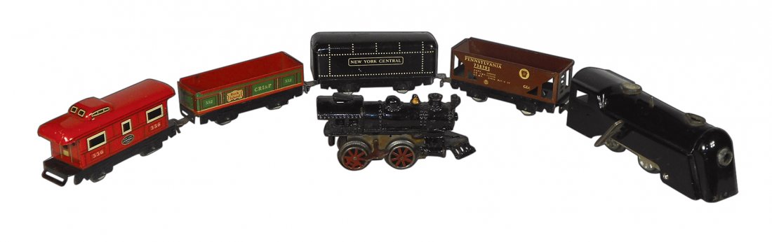 Toy train cars (6), Marx set of 5, metal, c.1950's &: Toy train cars (6), Marx set of 5, metal, c.1950's & earlier cast iron engine, both windups, both Exc cond, engine 8.5"L.