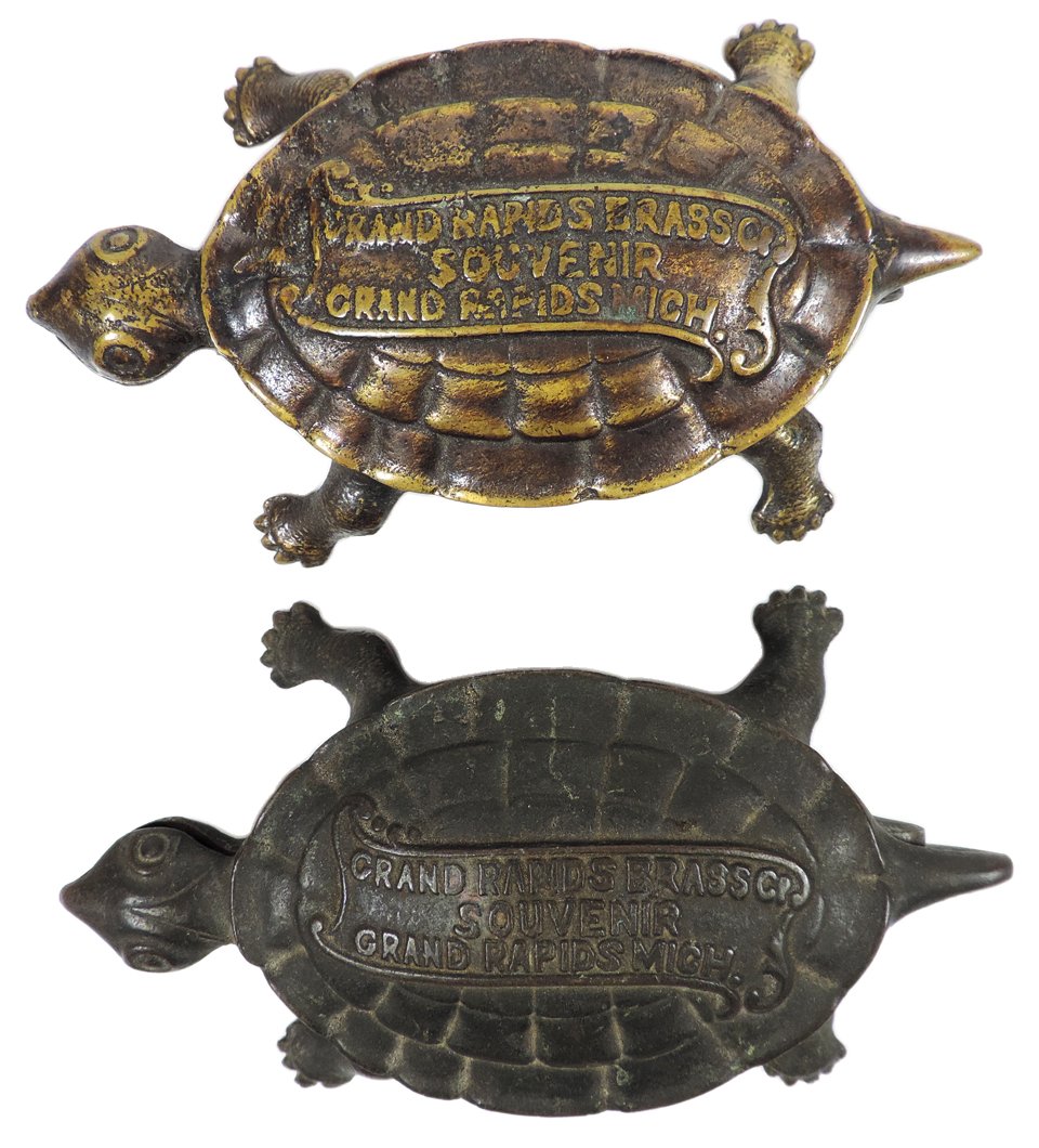 Tobacciana, figural turtle match safes (2), both: Tobacciana, figural turtle match safes (2), both advertising Grand Rapids Brass Co.-Grand Rapids, MI, one hinged & one lift-off lid, bottoms marked Mfgrs, Refrigerator & Furniture Hdwr., cast iron, Ex