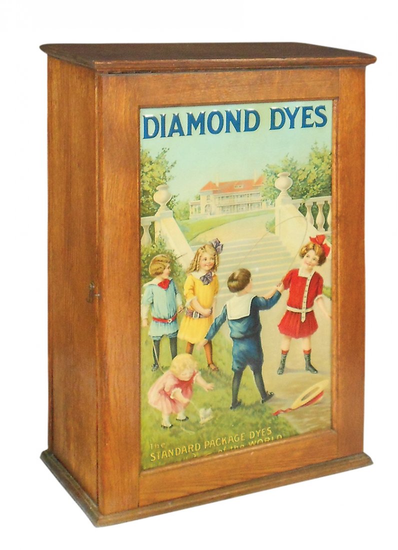 Country store Diamond Dyes cabinet, Mansion, aka: Country store Diamond Dyes cabinet, Mansion, aka Children Skipping Rope, embossed tin litho door insert, VG+/Exc cond, 24"H x 16"W x 8.5"D.