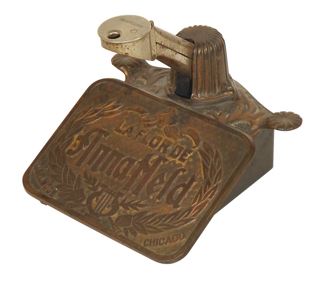Tobacciana, advertising cigar cutter, La Flor de Anna: Tobacciana, advertising cigar cutter, La Flor de Anna Held, mfgd by The Brunhoff Mfg Co.-Cinc, O., embossed front plate shows J & R Moos-Chicago, ornate cast metal, Exc cond, 5.5"H x 7"W x 6.5"D.