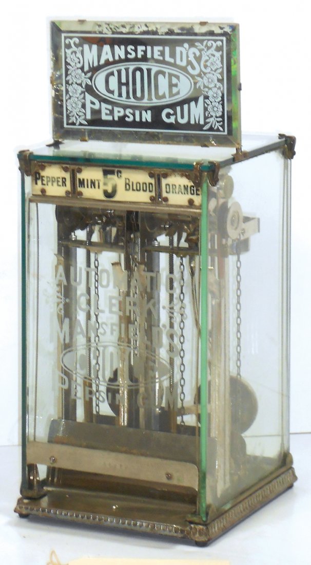Coin-operated machine, Mansfield's Pepsin Gum Automatic: Coin-operated machine, Mansfield's Pepsin Gum Automatic Clerk, glass case w/2-column mech that dispensed Peppermint & Blood Orange gum, some flaking on marquee border, o/wise Exc cond, 16"H x 7"W x 7.