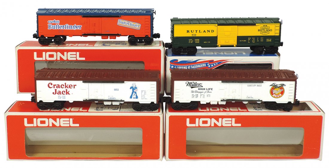 Model train cars (4), Lionel O gauge, 9710 Rutland;: Model train cars (4), Lionel O gauge, 9710 Rutland; 6-9853 Cracker Jack Reefer; 6-9852 Miller Reefer & 6-9858 Butterfinger, built 2-73, all in boxes, Exc cond, 10"-13"L.