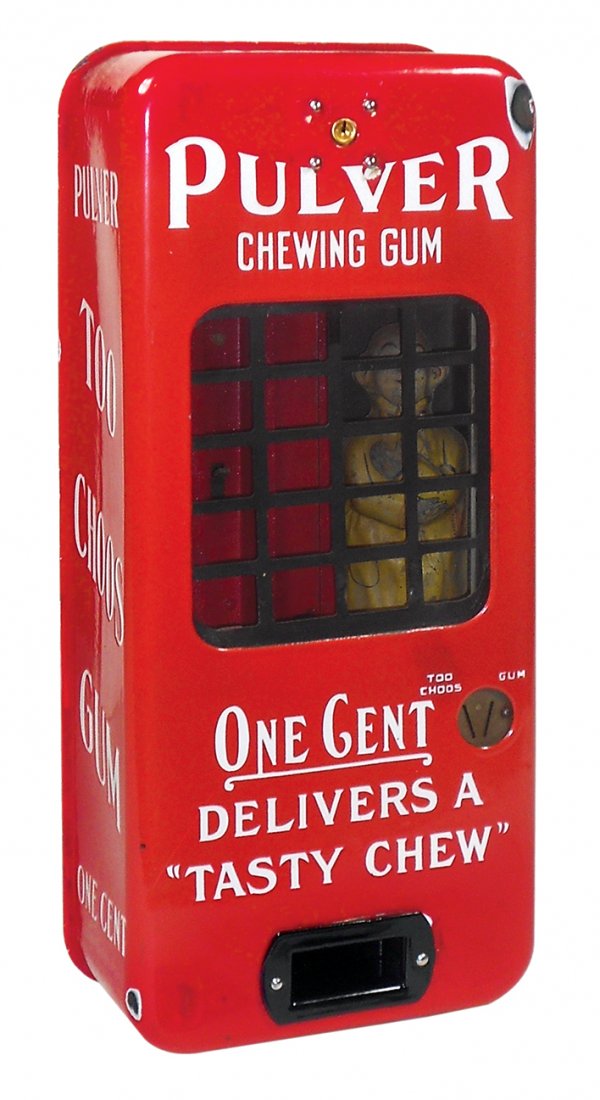 Coin-operated gum machine, Pulver Too Choos Chewing: Coin-operated gum machine, Pulver Too Choos Chewing Gum, 1 Cent, porcelain case w/orig Yellow Kid figure inside, Good+ working cond w/finish losses on case & figure, inpainting at top center keyhole &