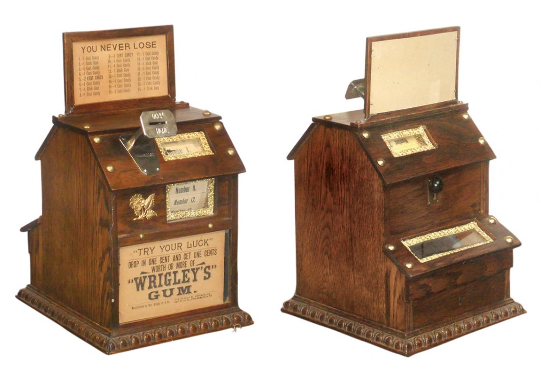 Coin-operated gum machine, Wrigley's One Cent vendor,: Coin-operated gum machine, Wrigley's One Cent vendor, mfgd by Wm Wrigley Jr & Co.-Chicago, IL, added gold fabric trim around windows, VG working cond, 14"H x 8.5"W x 9"D.