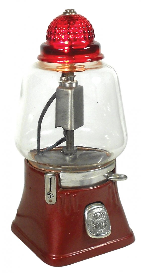 Coin-operated peanut machine, Hot Nut, mfgd by Silver: Coin-operated peanut machine, Hot Nut, mfgd by Silver King c.1947, 5 Cent, aluminum base w/ruby glass top that lights up & warms product, Exc working cond w/key, 15.5"H.