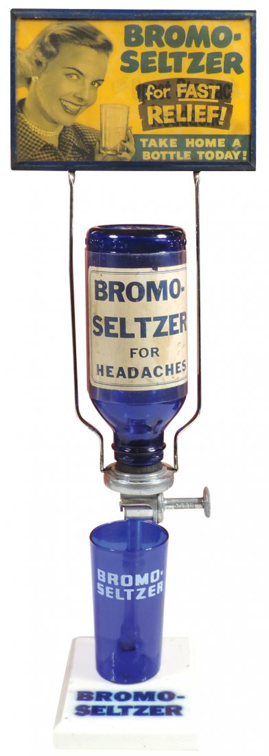 Drug store Bromo-Seltzer dispenser w/flicker marquee,: Drug store Bromo-Seltzer dispenser w/flicker marquee, oldest style w/ceramic "Bromo-Seltzer" base, cobalt blue dispensing bottle w/paper label & drinking glass, all Exc cond, 23.5"H.
