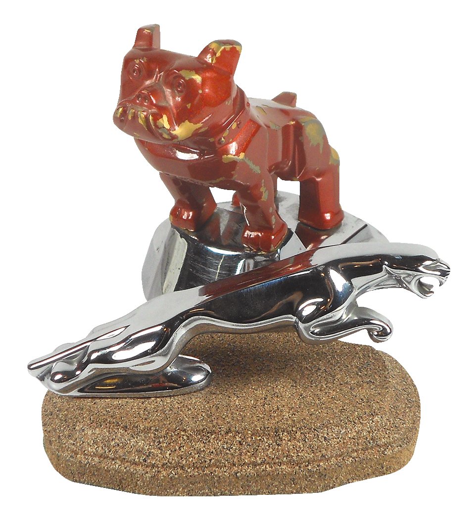 Mascot hood ornament, Mack Truck bulldog, cast metal: Mascot hood ornament, Mack Truck bulldog, cast metal w/gold plate under red paint, 5"H x 5"L & chrome Jaguar on composition base, Exc cond, 3"H x 5.5"L.