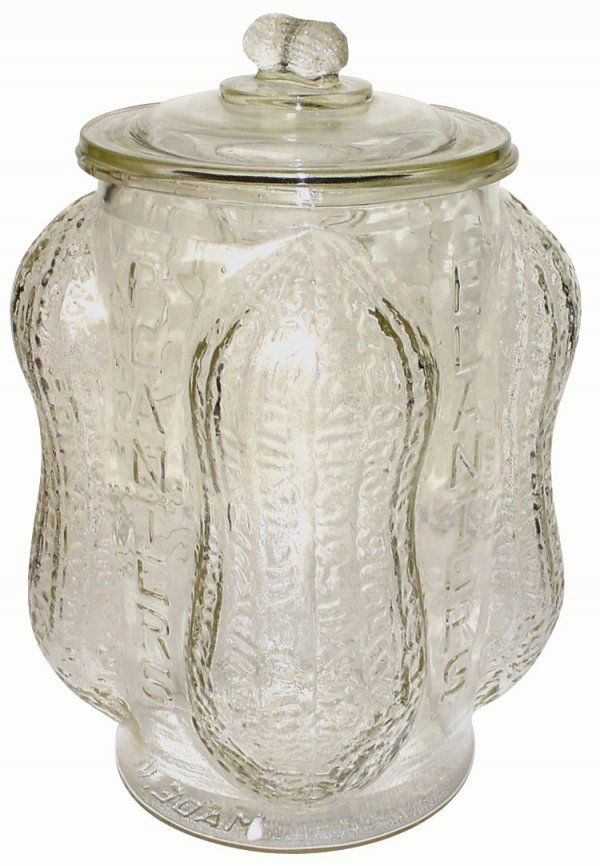 044: Planters Peanut jar, glass w/embossed peanut corne: Planters Peanut jar, glass w/embossed peanut corners, minor rim & lid chips, 14"H.