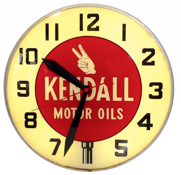 Kendall Motor Oil clock, electric light-up, heavy: Kendall Motor Oil clock, electric light-up, heavy metal frame w/glass face & bubble glass, paint on tips of 2 fingers is missing, otherwise VG working condition, 21"Dia.