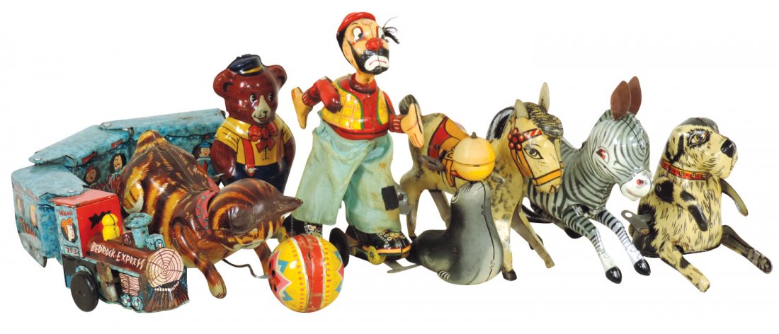 Toys (8), tin lithos, Japanese Roller Skating Clown,: Toys (8), tin lithos, Japanese Roller Skating Clown, Bouncing Mule, Modern Toys Cat w/Ball, Marx Flintstones 4-car train, Seal w/ball on nose friction, Chein Dancing Bear, Zebra w/orig hair tail-Chine