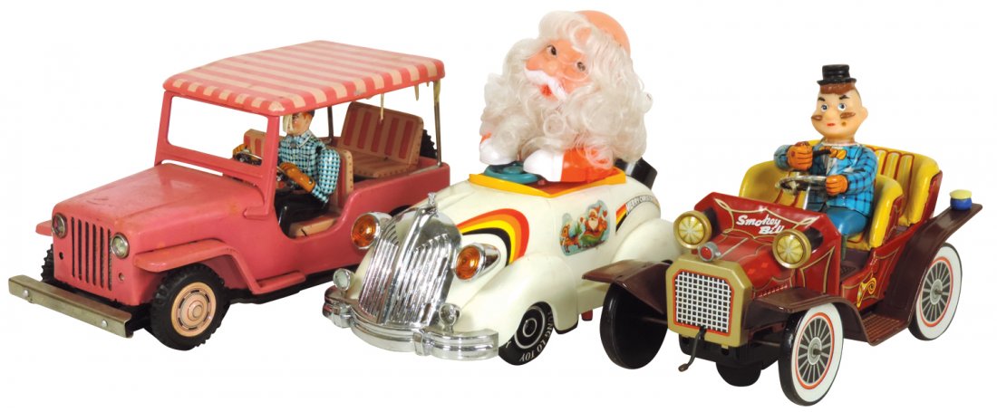 Toy cars (3), battery operated, Japanese tin litho: Toy cars (3), battery operated, Japanese tin litho Smokey Bill, Yung Lo Toys plastic Merry Christmas VW & tin litho jeep w/driver, all VG cond, up to 6"H x 11"L.