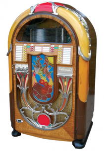 Coin-operated jukebox, Wurlitzer 850, a design: Coin-operated jukebox, Wurlitzer 850, a design masterpiece by Paul Fuller, c.1941, older restoration, missing bubble tube in grill at front right, a beautiful machine that plays well, 66"H x 38"W x 29